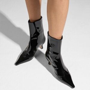 Black Aeyde patent leather pointed-toe boots